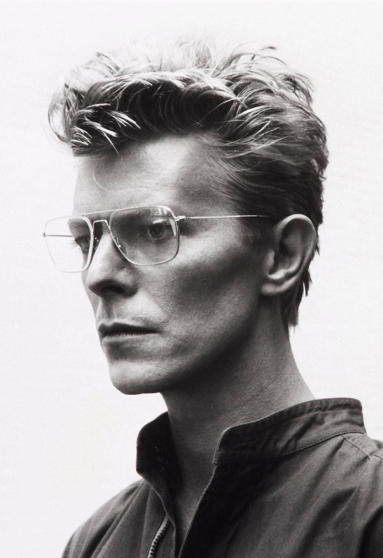 David Bowie (in Glasses) by Helmut Newton